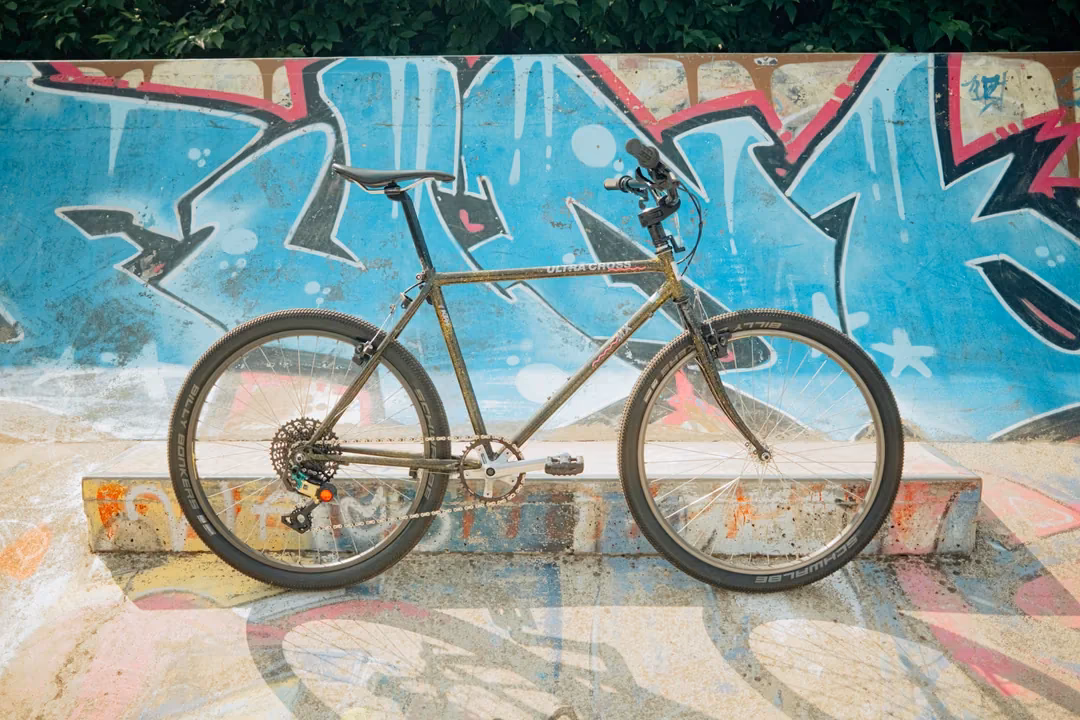 1991 KTM Ultracross MX against a graffiti wall at the skatepark
